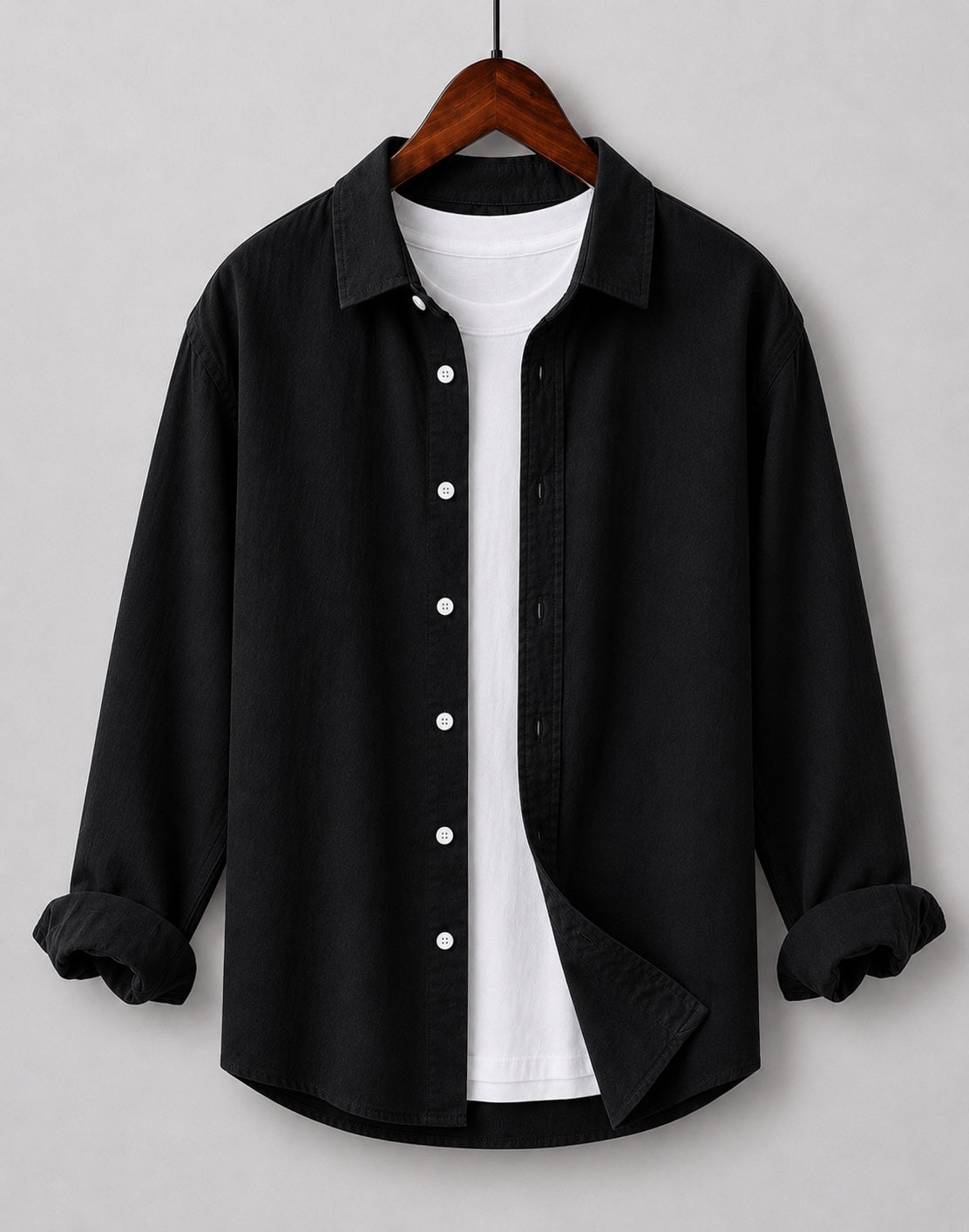 Black linen blend kids shirt on hanger with white inner